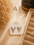 Silver Heart Glow Stud Earrings